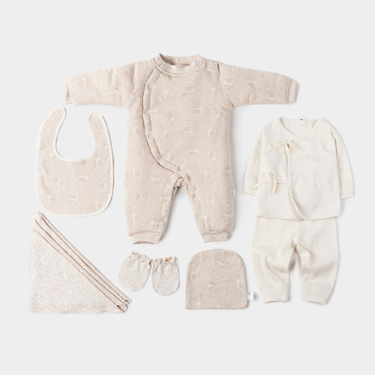 Baby shower gift set with essential items.