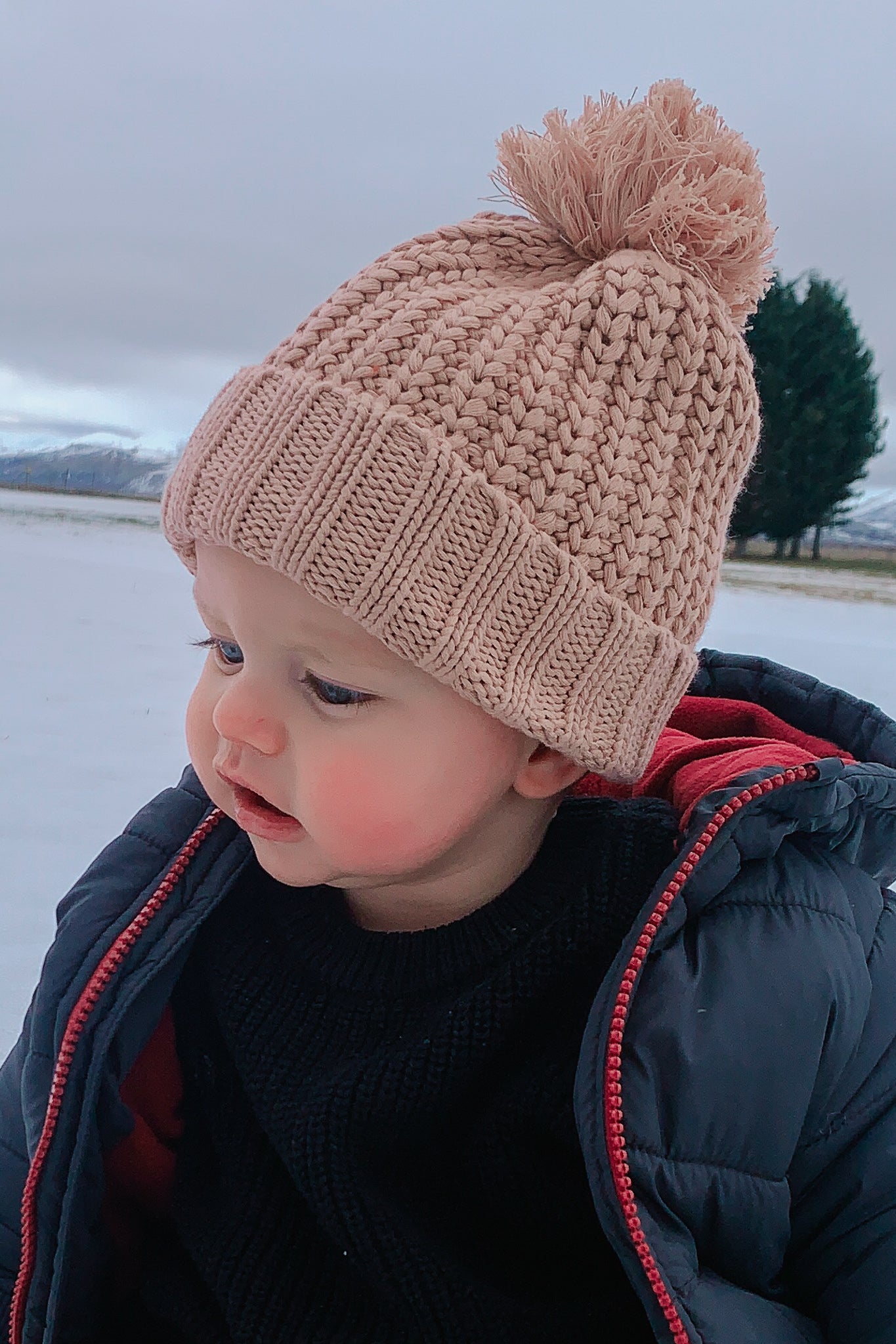 baby wearing knitted beanie