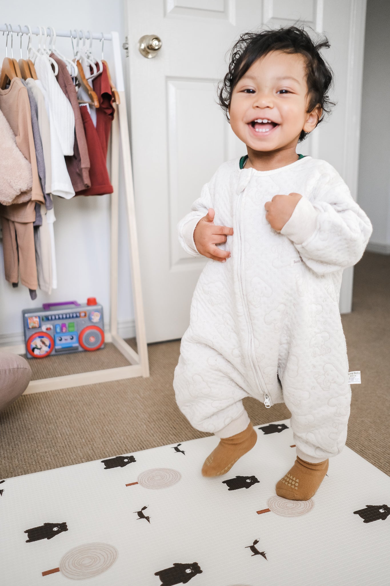 Baby wearing sleep suit and socks