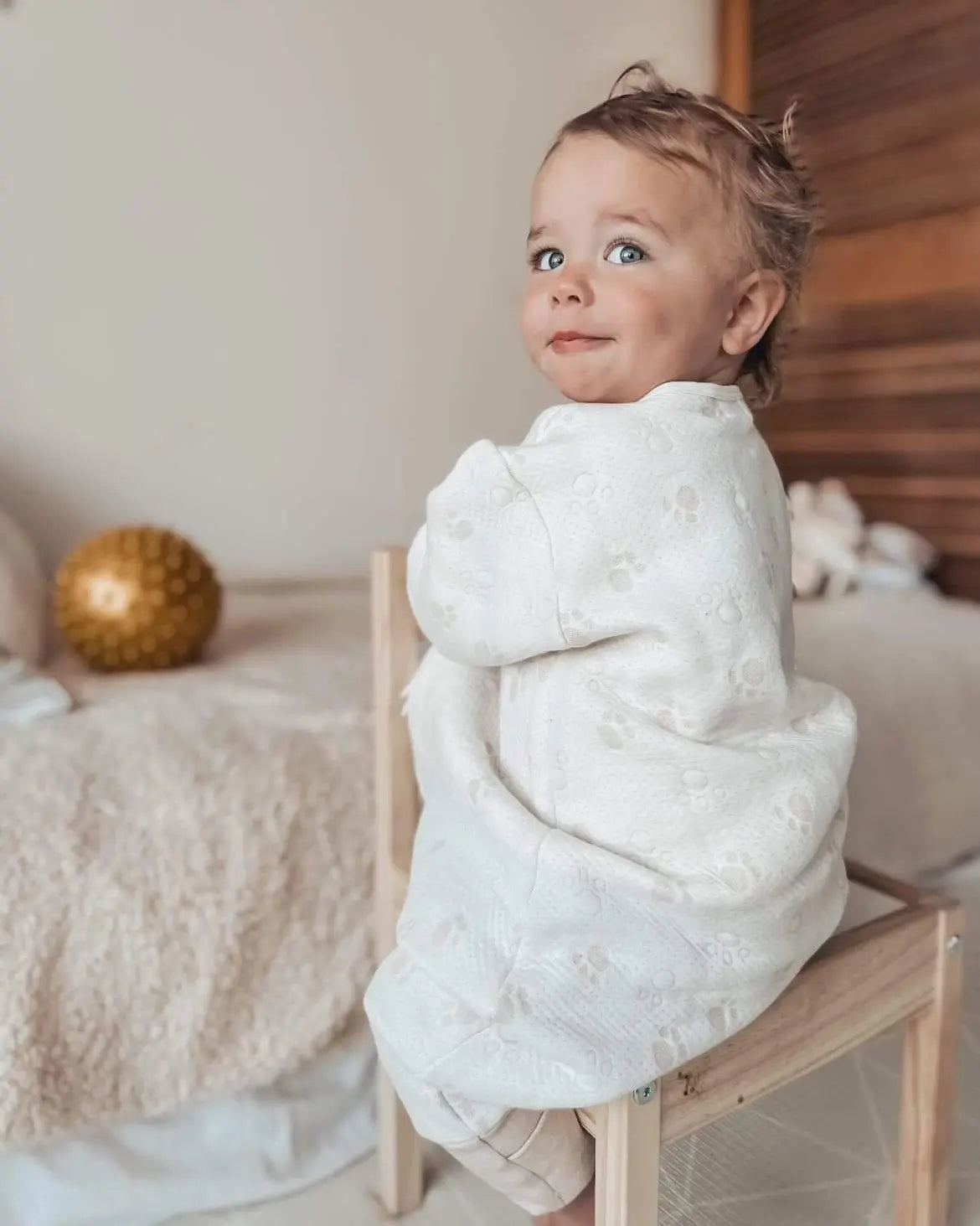 Toddler wearing sleepsuit