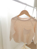 Baby sweater on a hanger