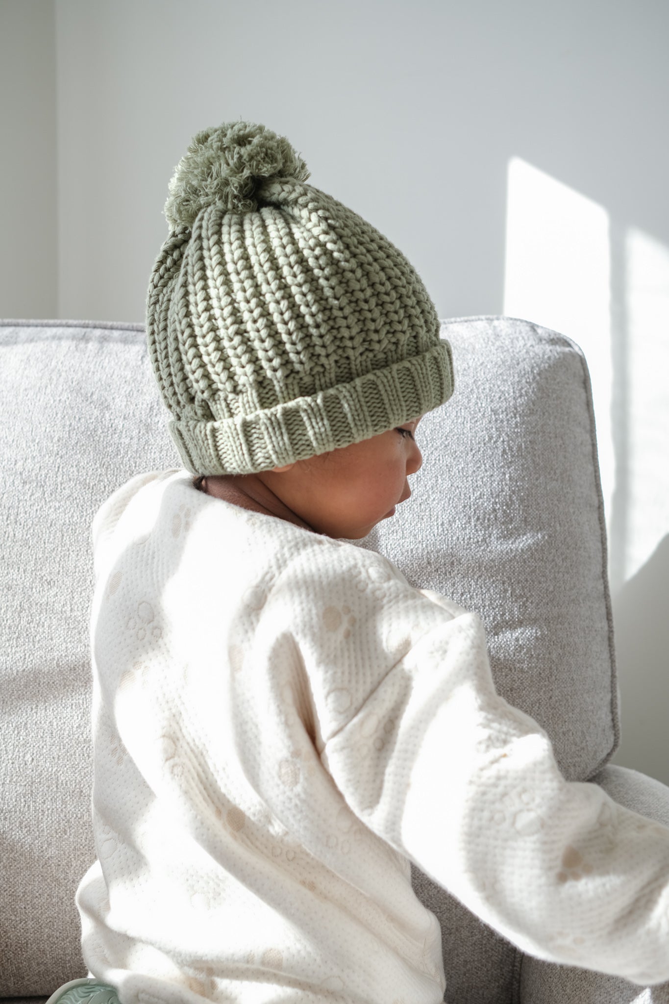 baby wearing knitted beanie