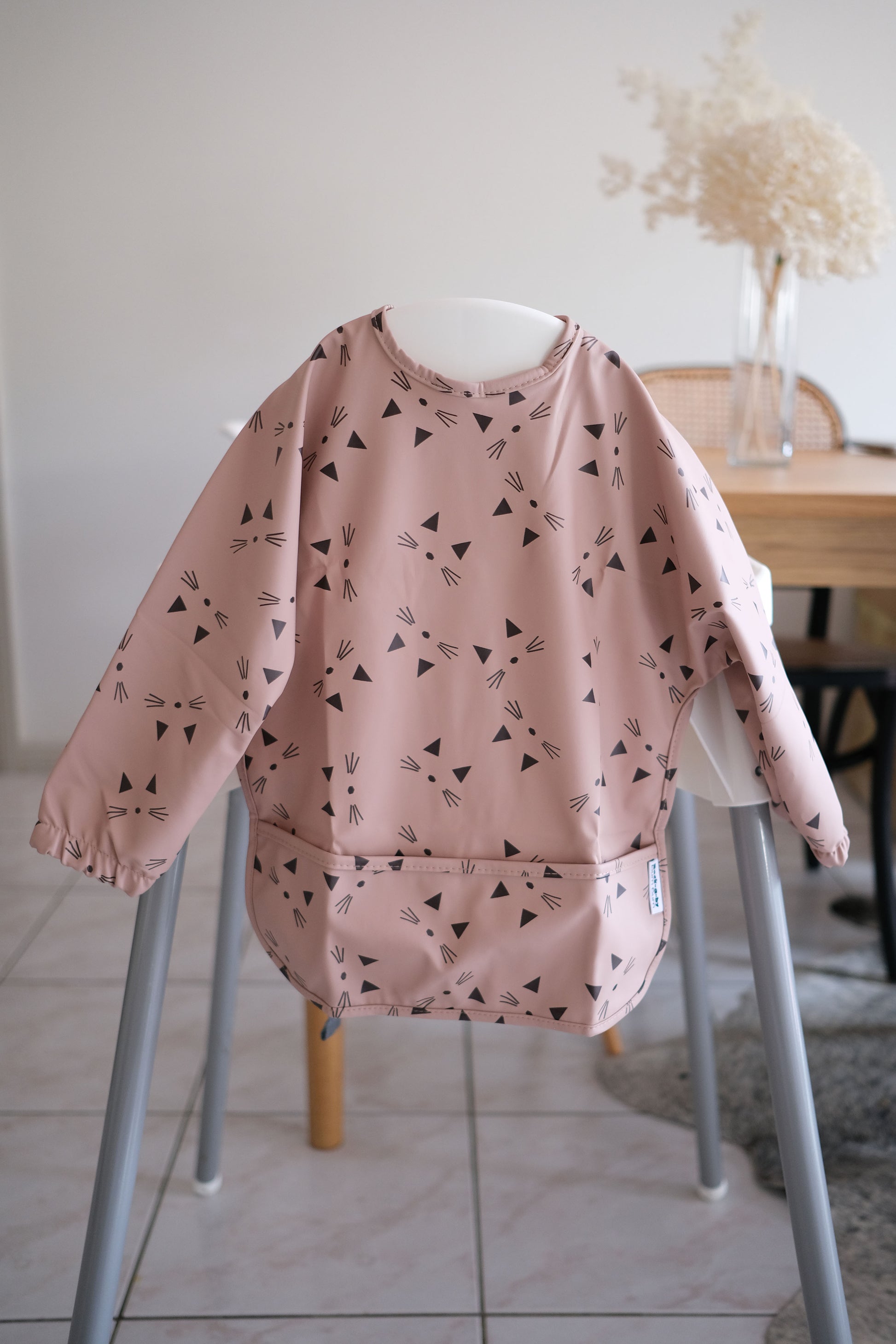 Long sleeve bib in blush pink kitty cat design