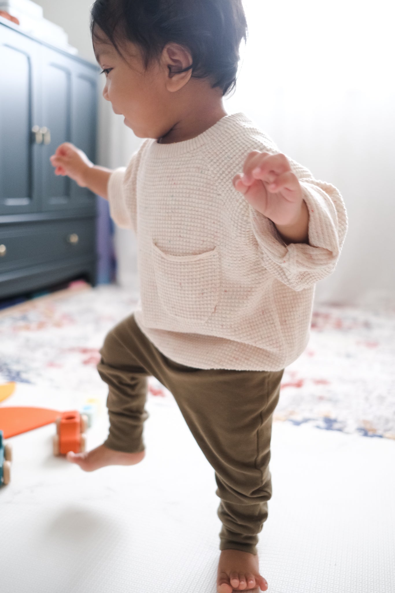 Baby wearing knit sweater