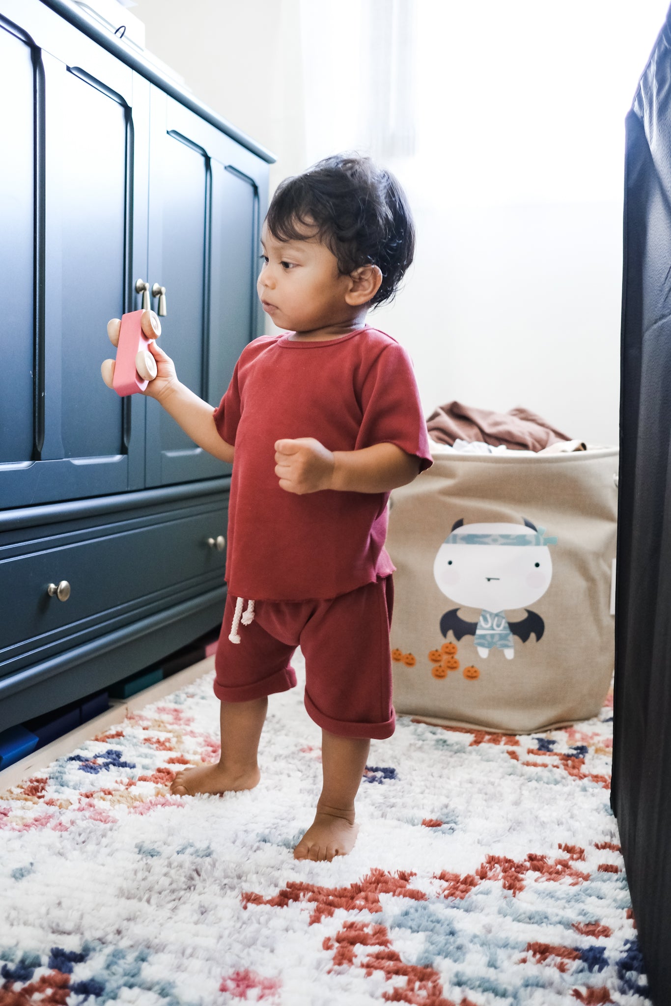 Baby boy wearing maroon summer clothing set