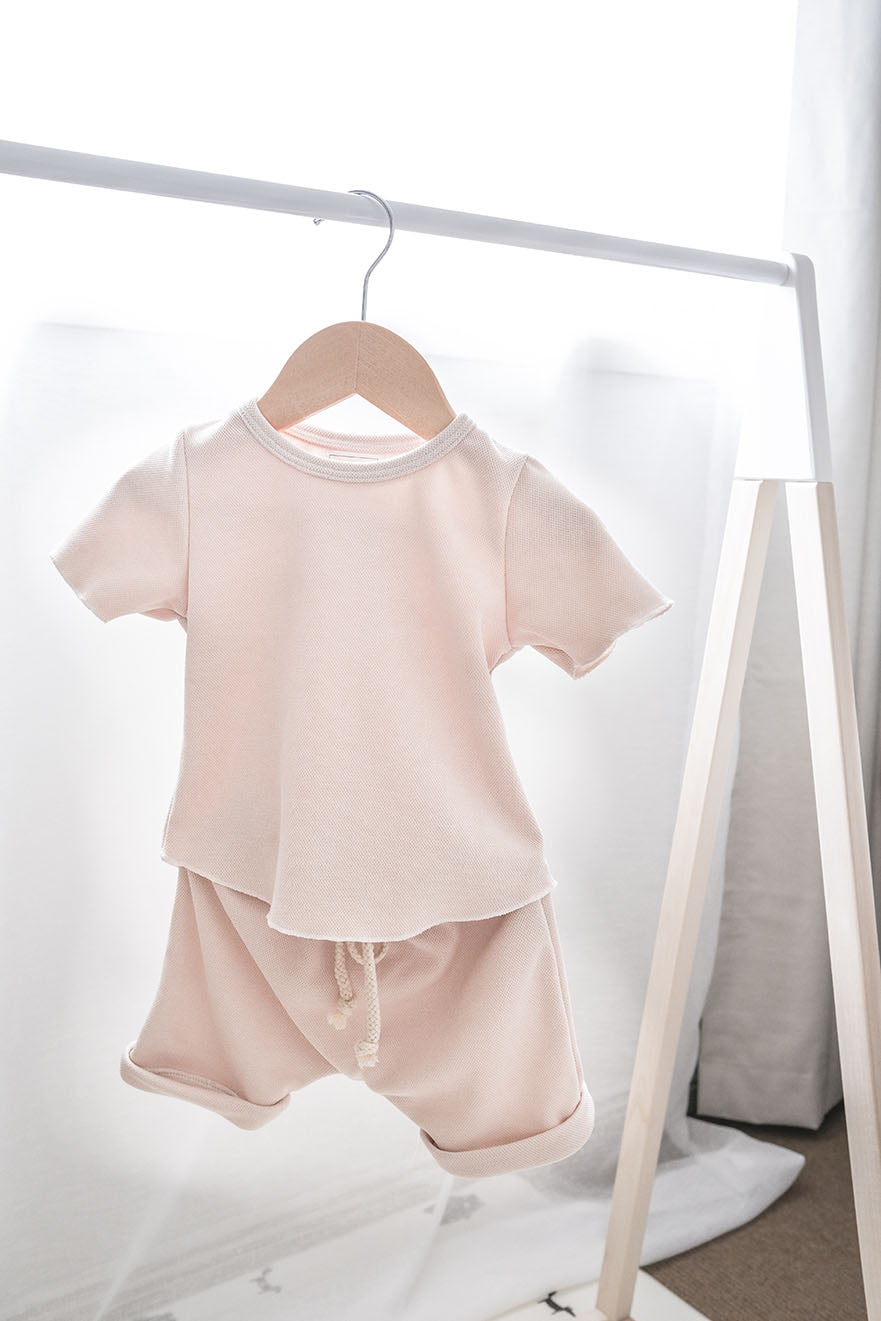 Baby boy clothing set on a hanger 