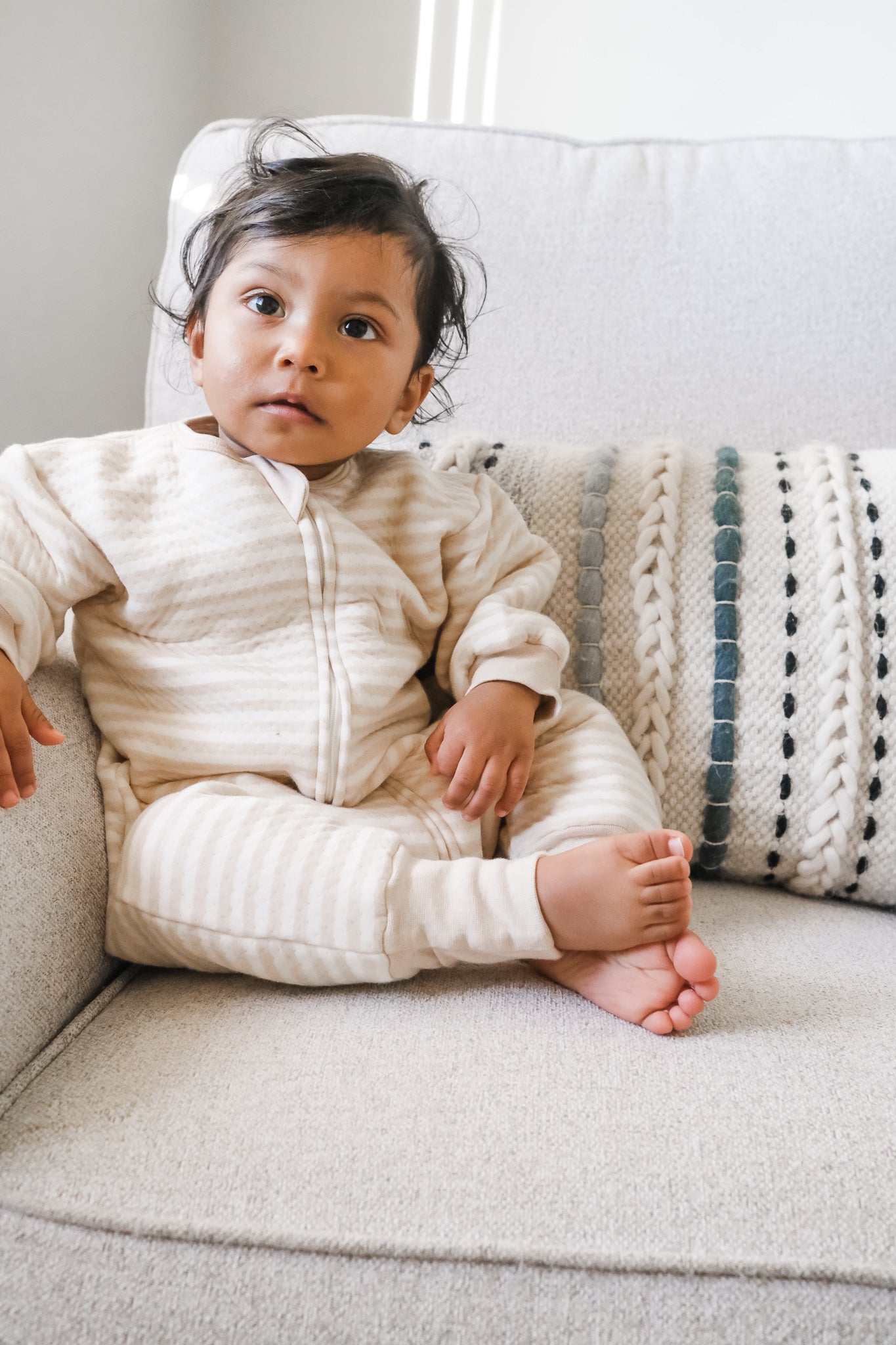 Toddler wearing sleep suit