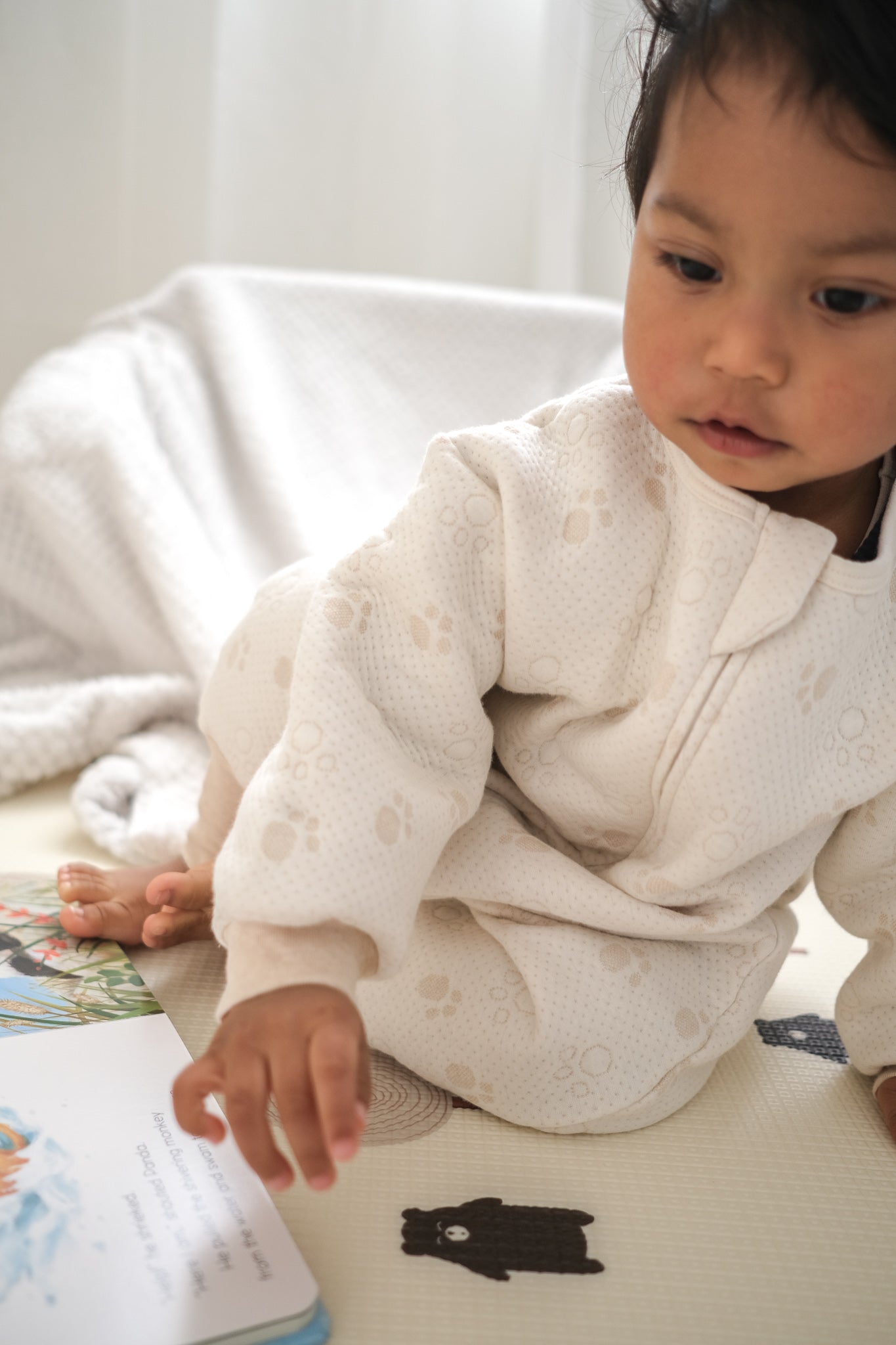 toddler wearing sleepsuit