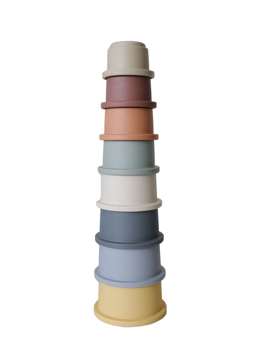 baby stacking cups in pastel